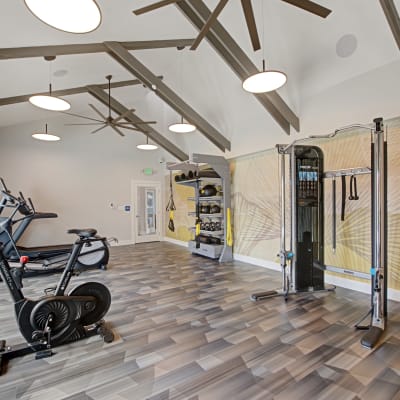 Resident fitness center with various cardio and weight exercise equipment ready to be used for a workout at Sofi Ventura in Ventura, California