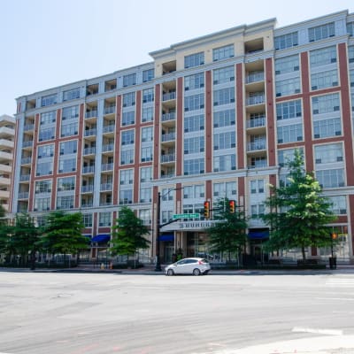 Exterior view of the gorgeous building surrounded by some nice trees at Sofi 55 Hundred in Arlington, Virginia