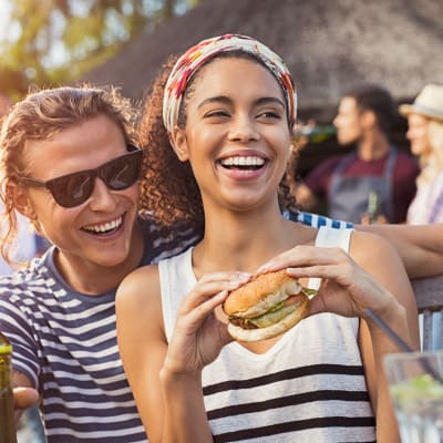 a couple outside enjoying a bbq at Forster Hills in Oceanside, California