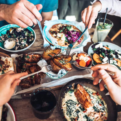 Residents sharing a meal at a favorite local eatery near Motif Apartments in Lynnwood, Washington