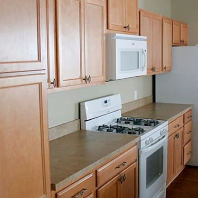 a kitchen with updated appliances at The Village at New Gosport in Portsmouth, Virginia