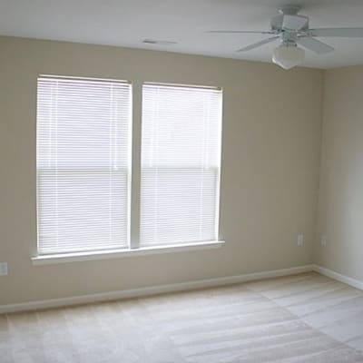 a sunny bedroom at The Village at New Gosport in Portsmouth, Virginia