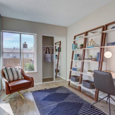 Modern furnishings in the open-concept living area of a model home at Sofi Thousand Oaks in Thousand Oaks, California