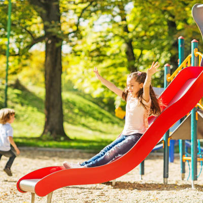 children playing on a playground at Longshaw Road in Annapolis, Maryland