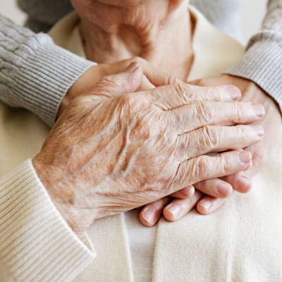 Caring hands at Cascade Park Adult Day Health in Tacoma, Washington