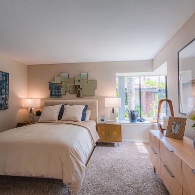 Modern furnishings in the bedroom of a model home at Sofi at Wood Ranch in Simi Valley, California