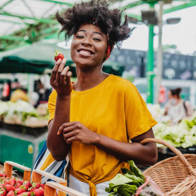 Grabbing some yummy fruit at the local market near The Met Rockville in Rockville, Maryland