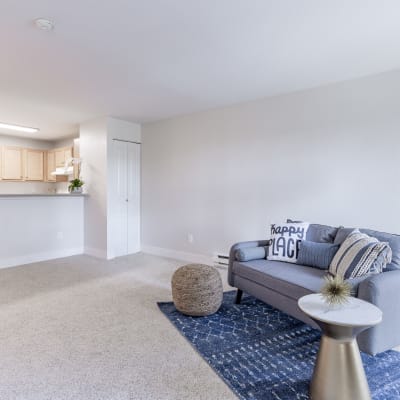 Large carpeted living room at The Knoll Redmond in Redmond, Washington