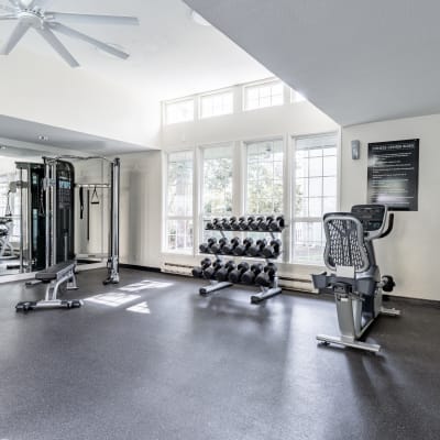Community gym with workout equipment at The Knoll Redmond in Redmond, Washington