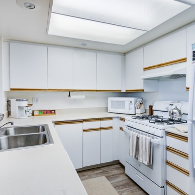White cabinets in a kitchen at Bayview Hills in San Diego, California