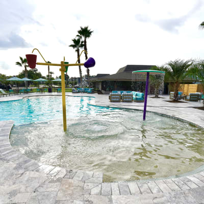 Pool at Emerald Pointe Apartment Homes in Harvey, Louisiana