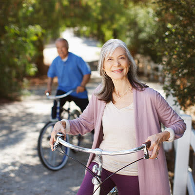 Couple riding bikes at Sandhill Shores in Stillwater, Minnesota