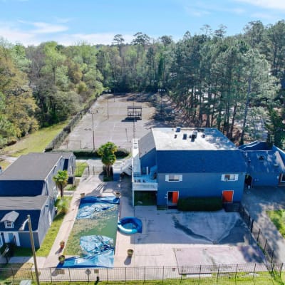 Aerial view of the community lounge and swimming pool at The Residence at Patriot Place in Columbus, Georgia