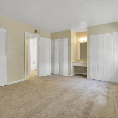 Plush carpeting in a spacious apartment bedroom at Rivers Edge Apartments in Jonesboro, Georgia