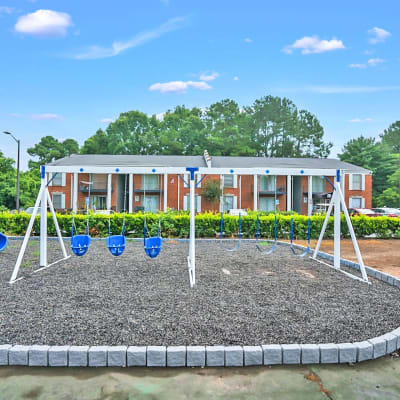 A swing set on the playground at Residence at Riverside in Austell, Georgia