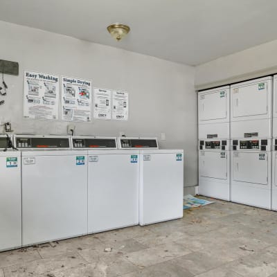 Washers and dryers in the laundry facility at Stanton View Apartments in Atlanta, Georgia