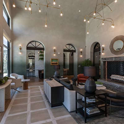 Living room with fireplace at Auro Crossing in Austin, Texas