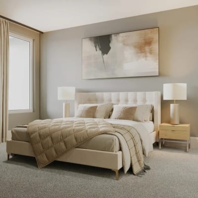 A furnished model apartment bedroom at Chandler Residences in Roswell, Georgia