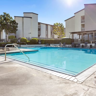 Large swimming pool for residents on a beautiful sunny day at The Villas at Woodland Hills in Woodland Hills, California
