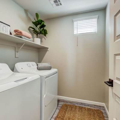 Washer and dryer in laundry room at BB Living at Trails Edge in Centennial, Colorado