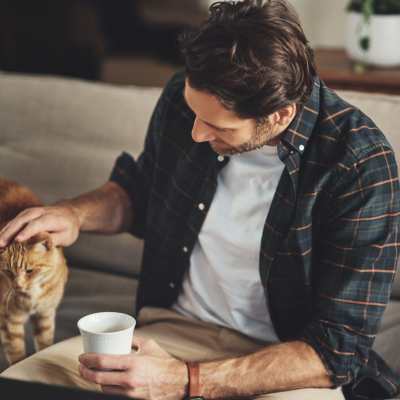 Resident with cat at Alterra in Tucson, Arizona