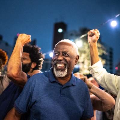 Resident lacing up his running shoes for a run on the track near Chesapeake Landing in Muskegon, Michigan