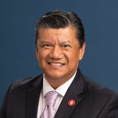 Business portrait of Luis Lopez, Vice President of Training and Development at Liberty Military Housing in Newport Beach, California