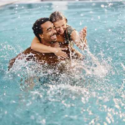 residents relaxing in pool at Ansley Murrayhill in Tigard, Oregon