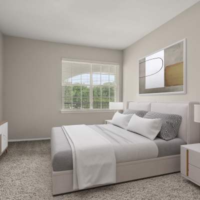 Well-lit bedroom at Breckinridge Point Apartments in Richardson, Texas 