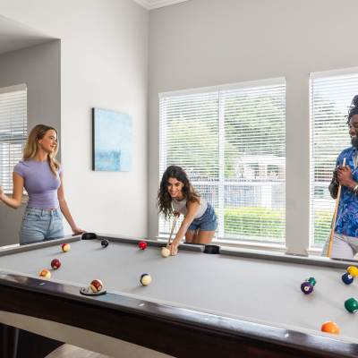 Clubhouse with billiard table at Breckinridge Point Apartments in Richardson, Texas  