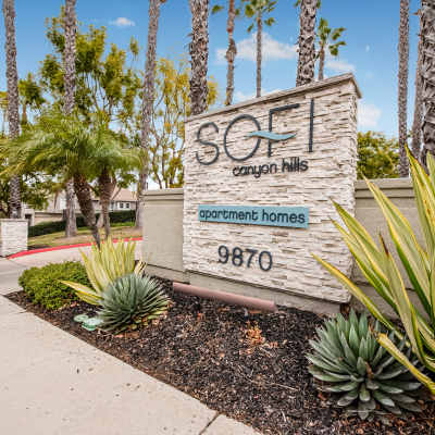 Professionally maintained landscaping outside resident buildings at Sofi Canyon Hills in San Diego, California