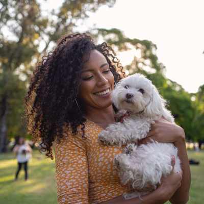 A resident woman with her pet dog at Parkland Village in District Heights,Maryland