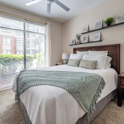 bedroom with bed and balcony
