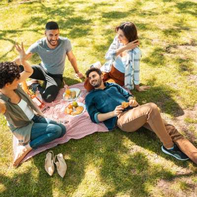 Friends in a park near Deer Creek in Middleton, Wisconsin