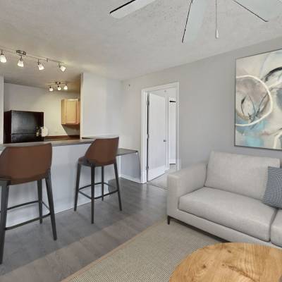 Thriving plants on a custom wood burl windowsill at Prudden Place in Lansing, Michigan