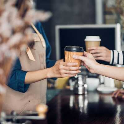 Hand with a coffee cup  Virginia Junction in Baden, Pennsylvania
