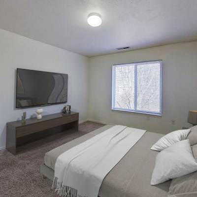 Resident lacing up his running shoes for a run on the track near Chesapeake Landing in Muskegon, Michigan