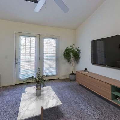 Resident lacing up his running shoes for a run on the track near Chesapeake Landing in Muskegon, Michigan