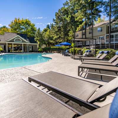Fire pit sitting area at The Cedars at Johns Creek in Johns Creek, Georgia