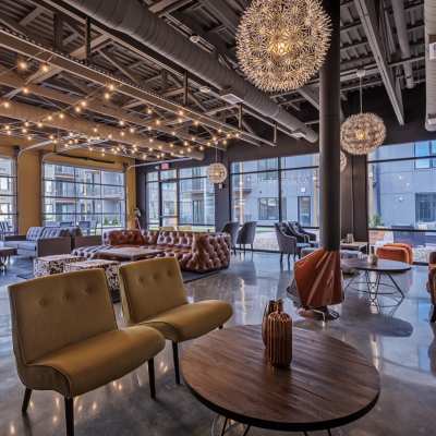 Chairs and tables with decorative lighting at 223 E Town in Columbus, Ohio