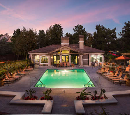 Gorgeous pool at dusk at Paloma Summit Condominium Rentals in Foothill Ranch, California