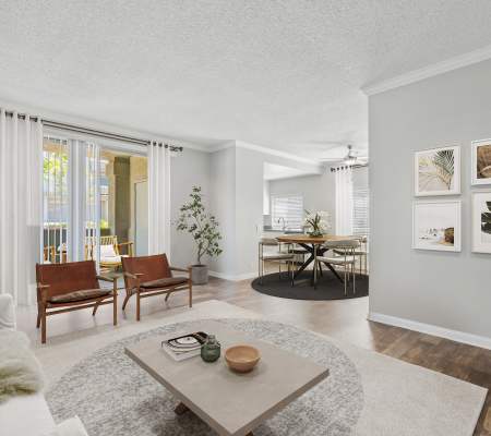 Luxury living room with hardwood style flooring at Paloma Summit Condominium Rentals in Foothill Ranch, California