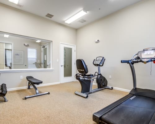 Fitness center with cardio equipment at Baxter Street in Charlotte, North Carolina