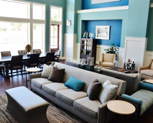 Community gathering area with blue accents at The Residences at Renaissance in Charlotte, North Carolina
