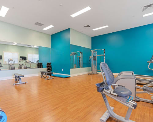 Fitness center with blue accents at The Residences at Renaissance in Charlotte, North Carolina