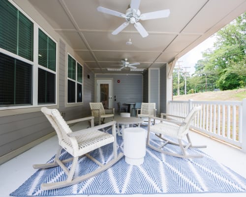 Covered patio with furniture and fan at Gilfield Park in Charlotte, North Carolina