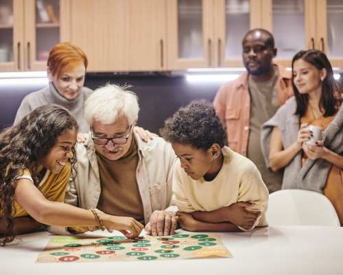 Residents playing board games Rosehill Gardens in Fayetteville, North Carolina