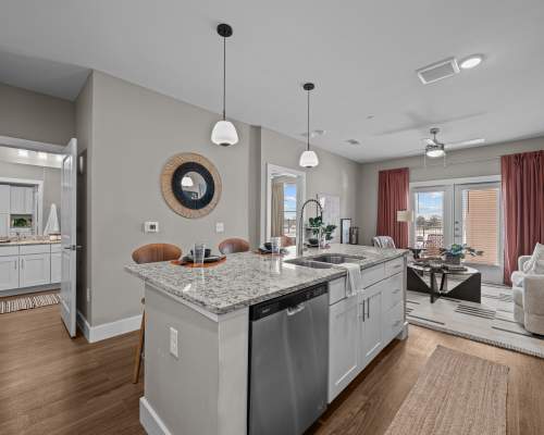 Spacious island kitchen with pendant lighting at Cavalry at Liberty Hill in Georgetown, Texas, 