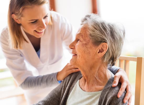 Nurse with resident at Westminster Memory Care in Aiken, South Carolina