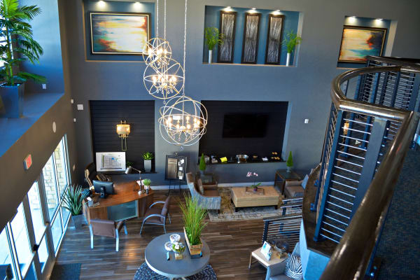 Interior view of the stunningly decorated clubhouse at The Abbey at Dominion Crossing, featuring billiards table